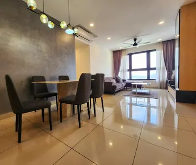 a living room with a table and chairs at Luxury Spacious 4 Bedroom Suite - Cheras Maluri MRT in Kuala Lumpur