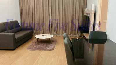 a living room with a couch and a table at SG Residence Kuala Lumpur by Fortune Suites in Kuala Lumpur