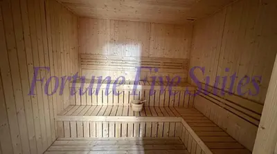 a room with a sauna with a toilet in it at SG Residence Kuala Lumpur by Fortune Suites in Kuala Lumpur