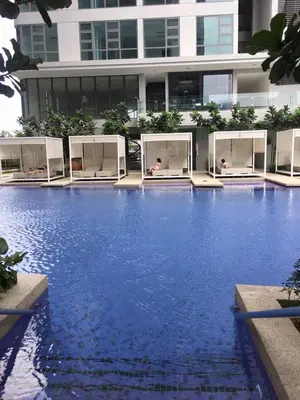 a large swimming pool in front of a building at Robertson Bukit Bintang in Kuala Lumpur