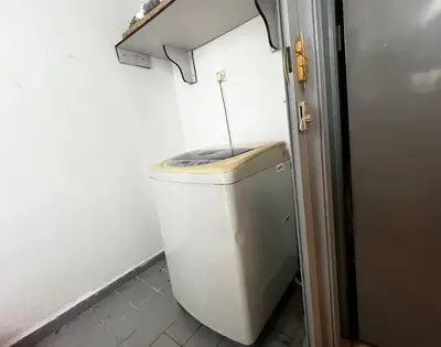 a white toilet in a bathroom with a wall at 3BR at Pantai HillPark near University Malaya Mid Valley in Kuala Lumpur
