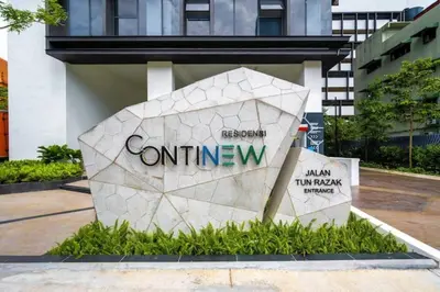 a sign for the entrance to a building at 2Bedroom near TRX By RumaBnb in Kuala Lumpur