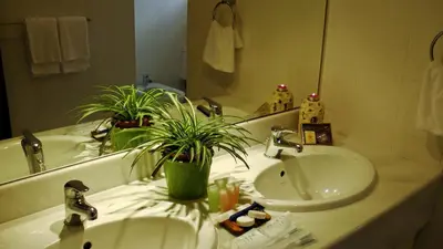 a bathroom with a sink and a mirror at 5 Twenty @ Ampang Hilir in Kuala Lumpur