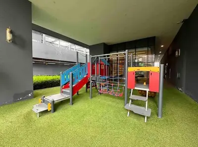 a play room with a playground with a train at Star Residence KLCC By M&T in Kuala Lumpur