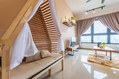 a living room with a bench with a wooden wall at MVB36#Bali Style 3 Rooms Family Suite M Vertica Velocity Mall Cheras in Kuala Lumpur