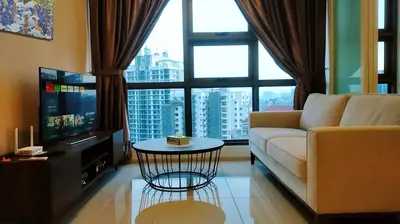 a living room with a couch and a large window at 2-Bed Luxury Resort Robertson in Kuala Lumpur