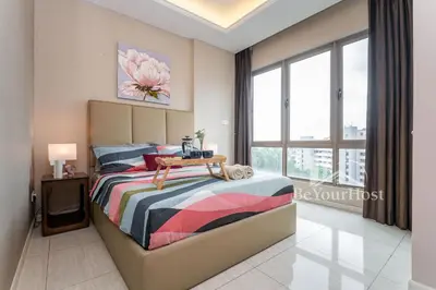 a bedroom with a bed and a large window at Dorsett Residences Sri Hartamas 5 Star Suites KL in Kuala Lumpur