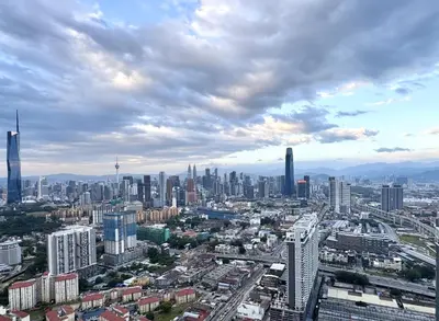 an aerial view of a city with tall buildings at Premium Skyscraper 1 Bedroom Suite in KL 1-3pax in Kuala Lumpur