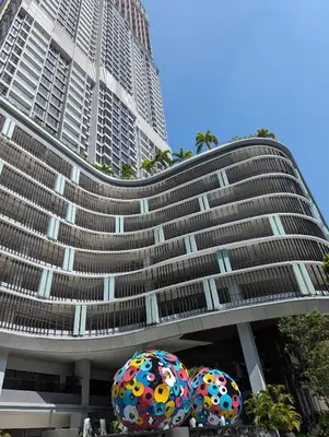 a tall building with two balls in front of it at Premium Skyscraper 1 Bedroom Suite in KL 1-3pax in Kuala Lumpur