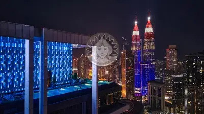 a view of a city skyline at night at HOME STYLE at Platinum Suites 2 KLCC Twin Towers in Kuala Lumpur
