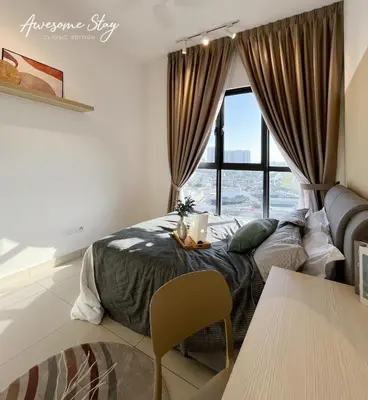 a bedroom with a bed and a large window at Residensi Trion in Kuala Lumpur