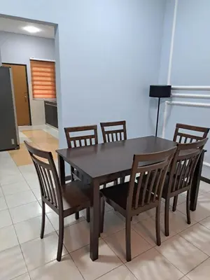 a dining room table with chairs and a table and a lamp at Double-story House in Kuala Lumpur in Ampang