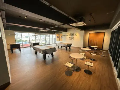 a large room with tables and chairs in it at Sunway Velocity Two Deluxe in Kuala Lumpur