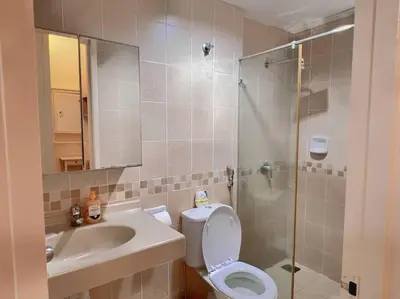 a bathroom with a toilet and a sink and a shower at Comfy Studio Casa Mutiara, Near LRT Hang Tuah & Lalaport in Kuala Lumpur
