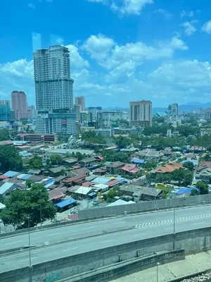 a cityscape of a city with buildings and roofs at Summer Suites Studio With Balcony Nearby KL City Centre in Kuala Lumpur