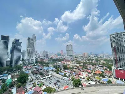 a city view of a city with tall buildings at Summer Suites Studio With Balcony Nearby KL City Centre in Kuala Lumpur