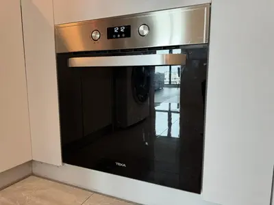 a microwave oven sitting inside of a wall at TheOoak 1BRoom cozyhome with balcony in Kuala Lumpur