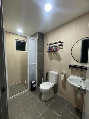 a bathroom with a toilet and a sink at Ayazuki Sky Suite KLCC View 2BR Free Parking Netflix Swimming Pool in Kuala Lumpur