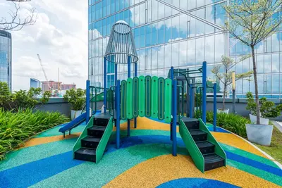 a playground in front of a building at Dorsett Residence Kuala Lumpur 8 pax in Kuala Lumpur