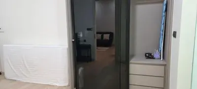 a room with a closet with a glass door at Star KLCC Twin Tower Suite 2-3pax by DingDing in Kuala Lumpur