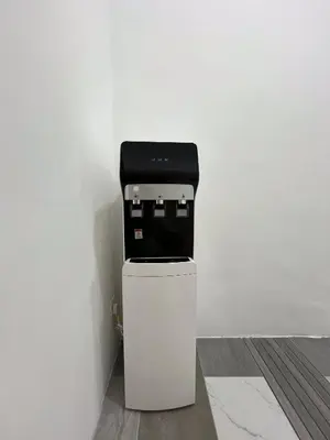 a coffee machine sitting on top of a refrigerator at Titiwangsa Premium Villa KL by uBook in Kuala Lumpur