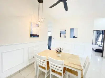 a dining room with a wooden table and chairs at Cheras KL Premium 3B2B by Luvit Stay in Kuala Lumpur