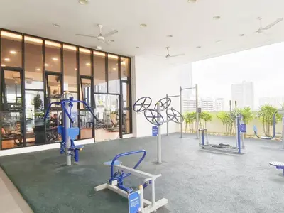 a gym with cardio equipment in front of a building at Cheras KL Premium 3B2B by Luvit Stay in Kuala Lumpur