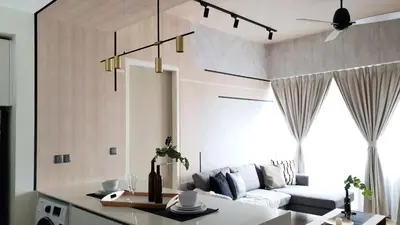 a living room with a couch and a table at Star KLCC Elegant 2-3pax by DingDing in Kuala Lumpur