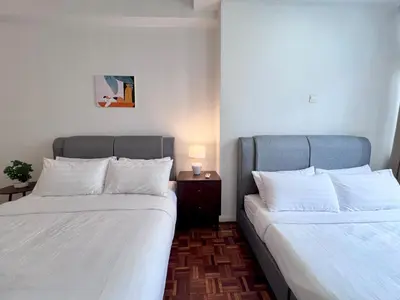 two beds sitting next to each other in a room at Fahrenheit 88 Kuala Lumpur in Kuala Lumpur