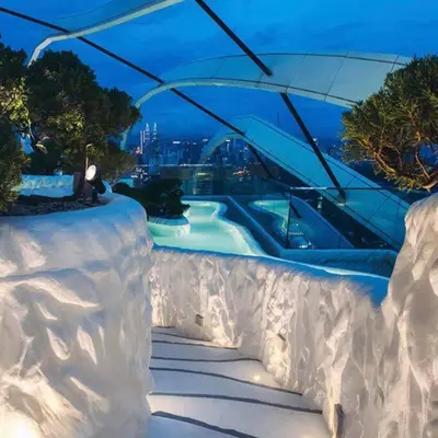 a snow covered swimming pool in a building at Arte Mont Kiara in Kuala Lumpur