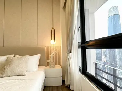 a bedroom with a bed and a large window at The Little Series - Bukit Bintang - TRX View - 4 Pax in Kuala Lumpur