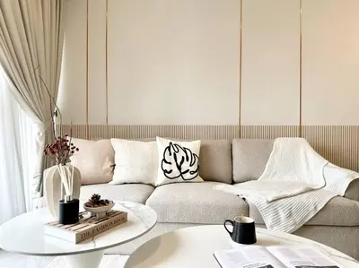 a living room with a couch and a table at The Little Series - Bukit Bintang - TRX View - 4 Pax in Kuala Lumpur