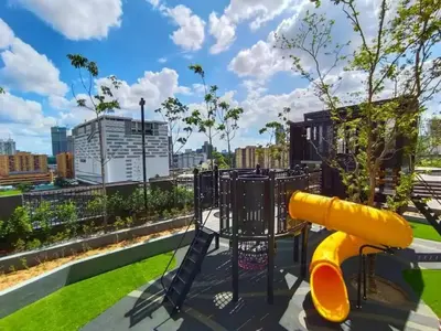 a playground with a slide in a park at Maxhome Elite at Lucentia in Kuala Lumpur