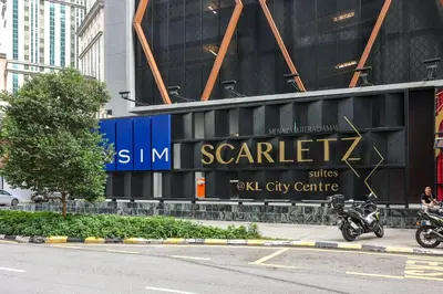 a sign on the side of a building at Scarletz Suites KLCC by GB in Kuala Lumpur