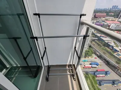 a balcony of a building with a view of a city at M 2-7pax 200mbpswifi near Mrt Lrt HKL IJN in Kuala Lumpur