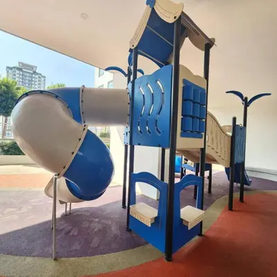 a blue and white playground with a slide at M 2-7pax 200mbpswifi near Mrt Lrt HKL IJN in Kuala Lumpur