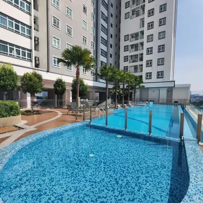 a large swimming pool in front of a building at M 2-7pax 200mbpswifi near Mrt Lrt HKL IJN in Kuala Lumpur