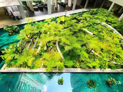 a model of a island with palm trees on top of water at Regalia Residence by Luvit Stay in Kuala Lumpur