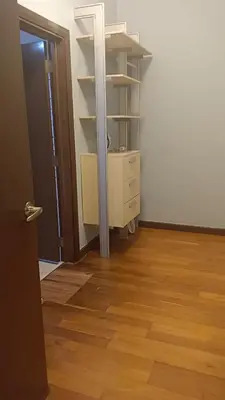 an empty room with a dresser and a closet at Regalia Suite 12-13 in Kuala Lumpur