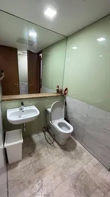 a bathroom with a toilet and a sink at City Centre KLCC in Kuala Lumpur