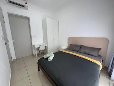 a bedroom with a large bed in a room at Trion KL by Dreamcloud Sdn Bhd in Kuala Lumpur