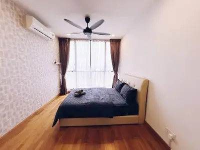 a bedroom with a bed with a ceiling fan at PROMO 2 ROOM Nice Design KL Gateway Residence 27 in Kuala Lumpur
