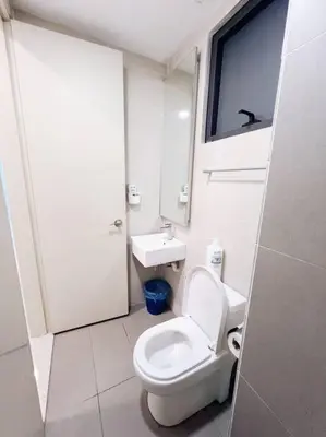 a bathroom with a toilet and a sink at PROMO 2 ROOM Nice Design KL Gateway Residence 27 in Kuala Lumpur