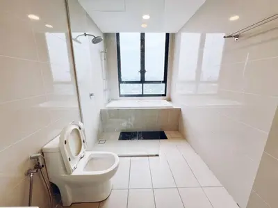 a bathroom with a toilet and a sink and a window at PROMO 2 ROOM Nice Design KL Gateway Residence 27 in Kuala Lumpur