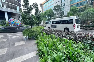 a white van parked in front of a building at Classic couple suite-Netflix-Free-Park Trion B6205St KL in Kuala Lumpur