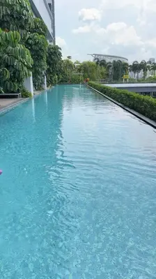 a large pool of blue water in a building at Classic couple suite-Netflix-Free-Park Trion B6205St KL in Kuala Lumpur