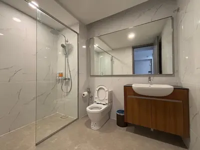 a bathroom with a toilet and a sink and a shower at Agile Bukit Bintang FaceHome, TRX, Pavilion, KL in Kuala Lumpur