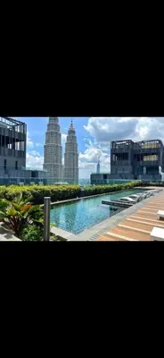 a view of a city with tall buildings at Star Residences One in Kuala Lumpur