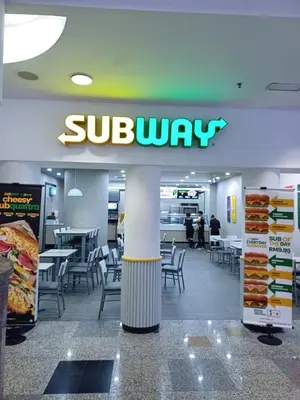 a subway restaurant with a subway sign on the wall at Kuala Lumpur Grand service suite at Times Square in Kuala Lumpur