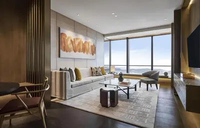 a living room with a couch and a table at Park Hyatt Kuala Lumpur in Kuala Lumpur